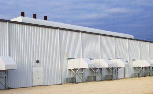 industrial wall fan with rain hoods exterior